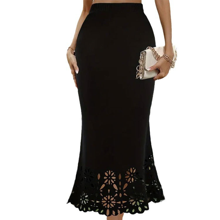 Bottom hugging hollow skirt