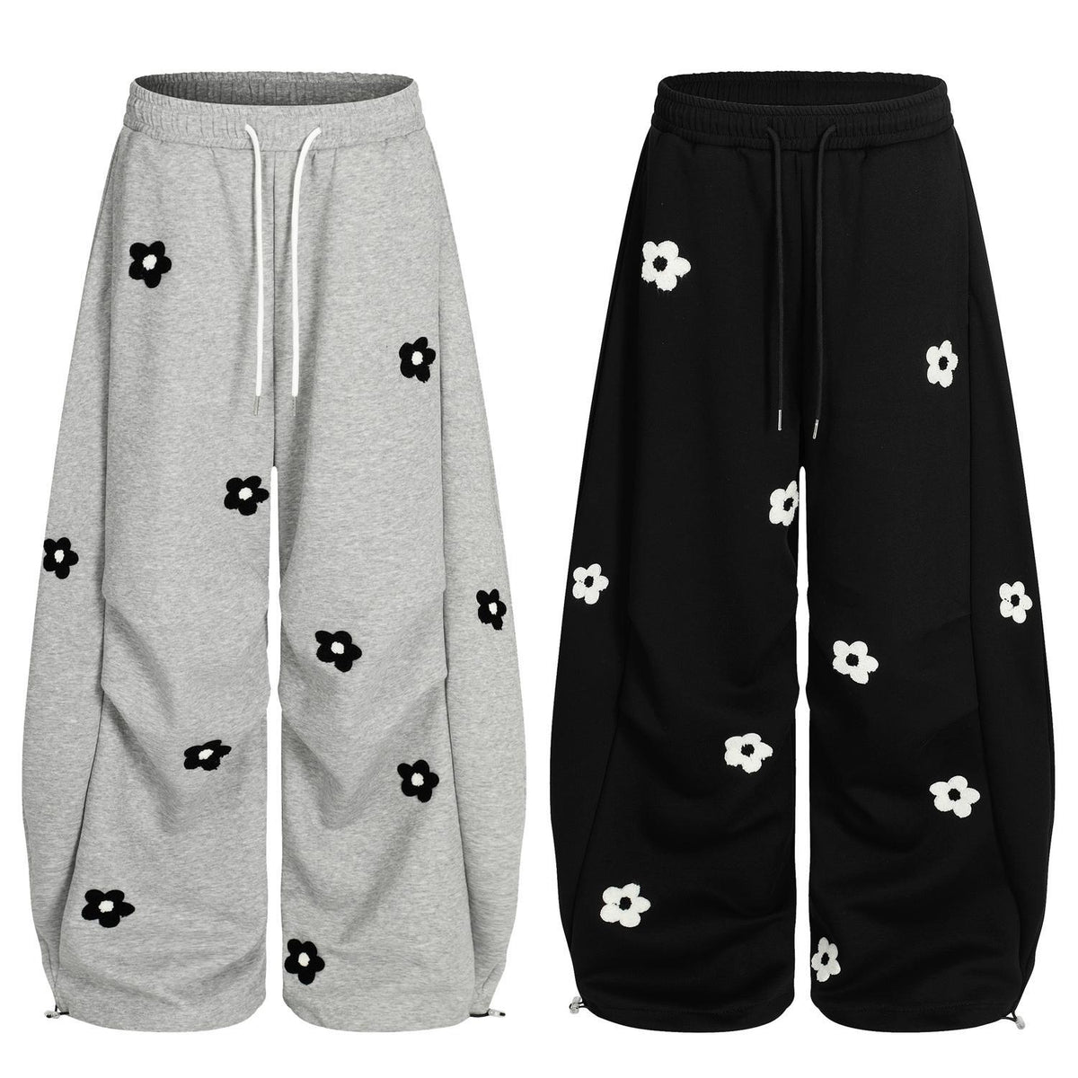Flower embroidery curved knife sweatpants for men and women