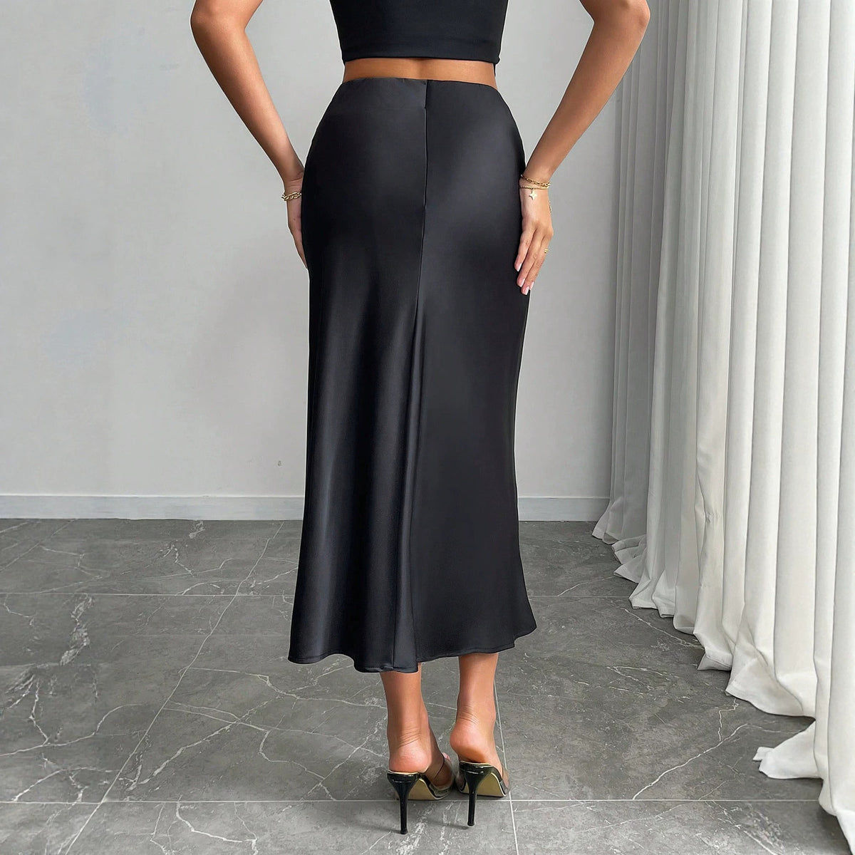Tailored fish tail half length skirt