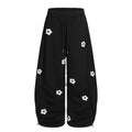 Flower embroidery curved knife sweatpants for men and women